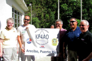 Arecibo Observatory Amateur Radio Club station KP4AO. Yaesu’s Exec Vice President for North American Sales Dennis Motschenbacher, K7BV, presented the group with an FT-DX 1200 transceiver for use at the new Arecibo Visitor Center station to promote amateur radio.